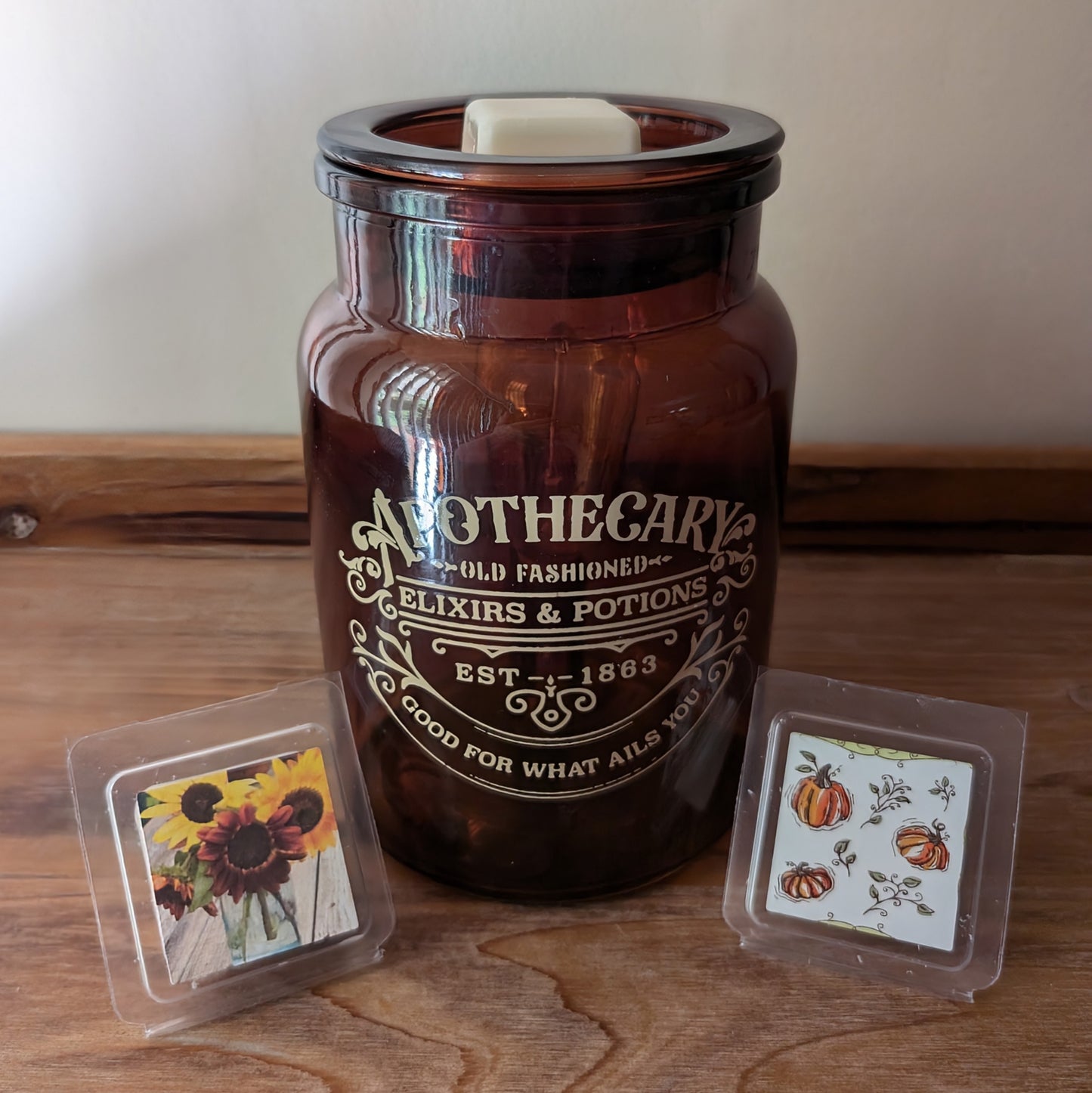 APOTHECARY ILLUMINATION FRACRANCE WARMER Amber color glass with a Edison style bulb